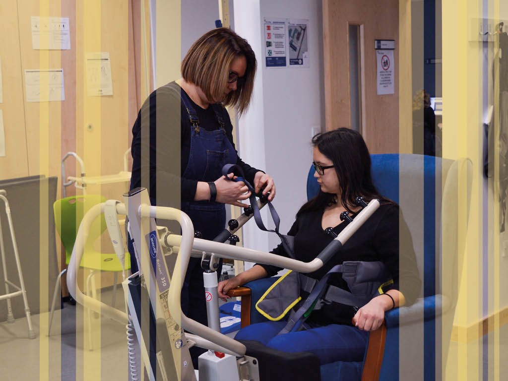 care student practice using equipment with yellow stripes on top of image