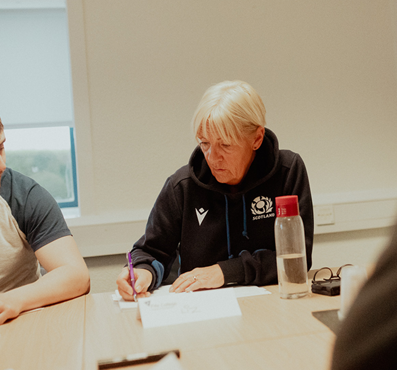 female business student writing