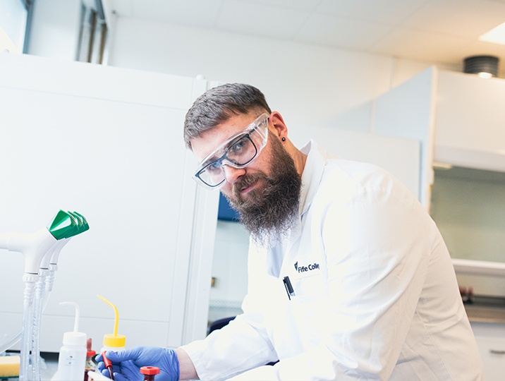science student smiling at camera