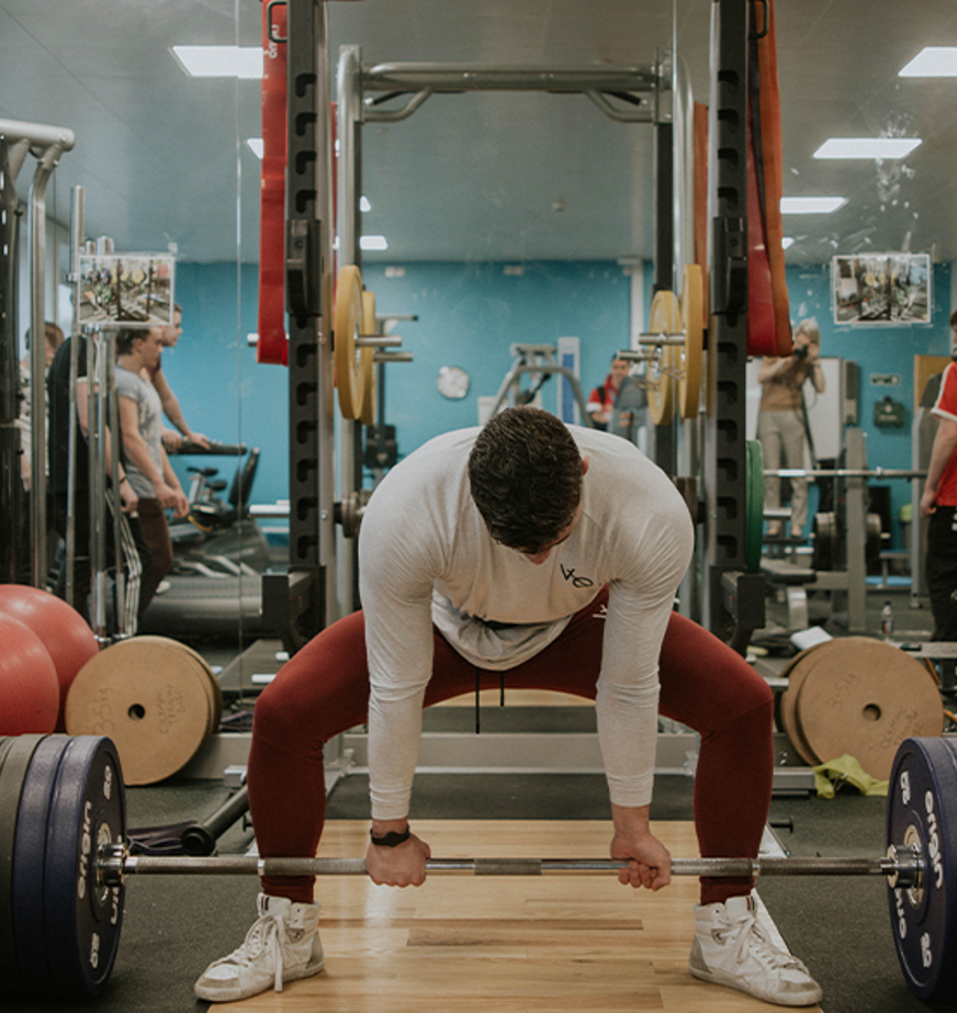 man deadlifting weight