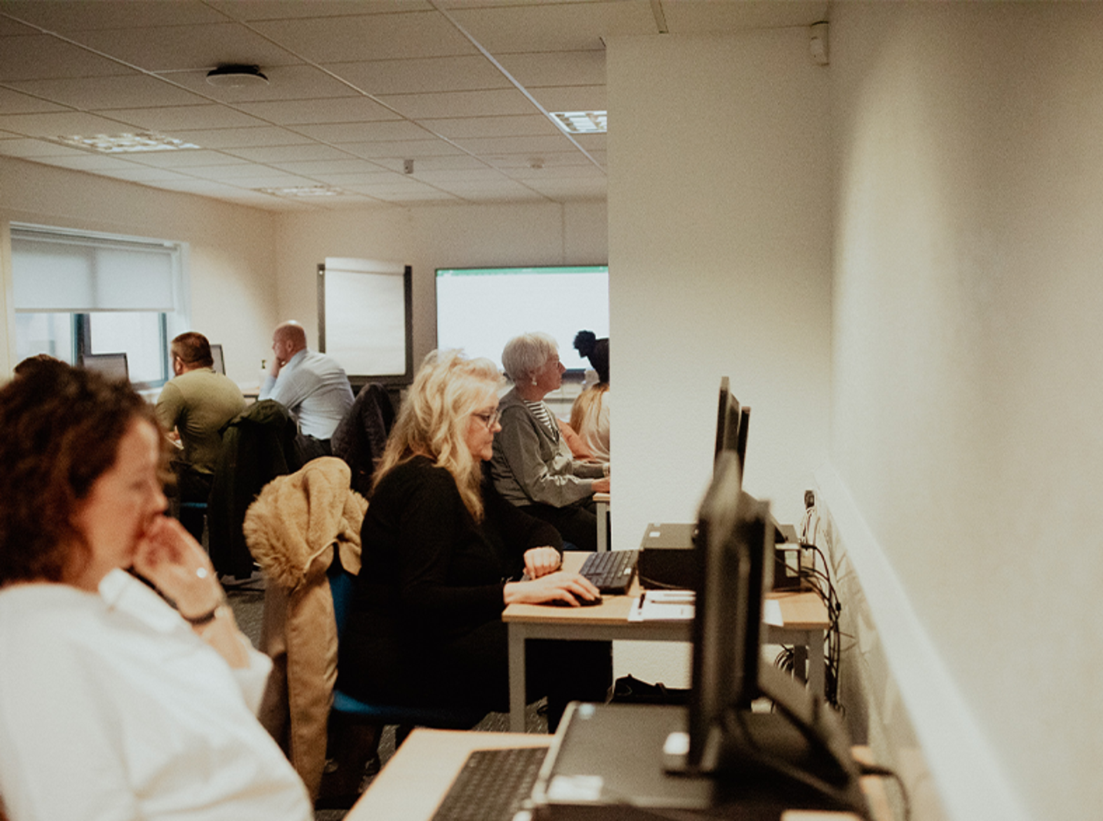 students on computer in classroom