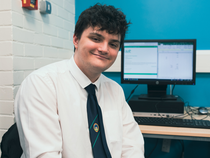 school pupil smiling at camera 