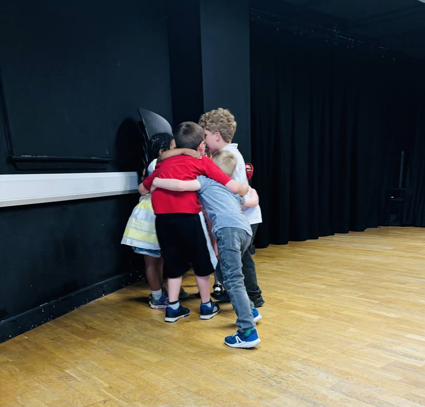 group of children hugging